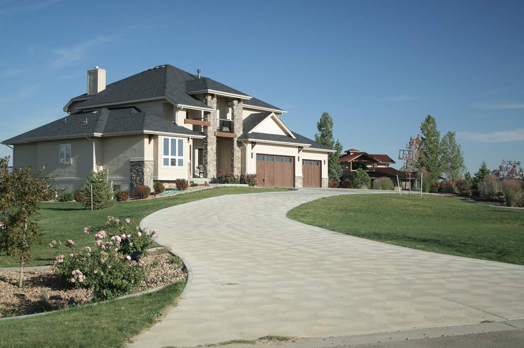 luxury home with large driveway